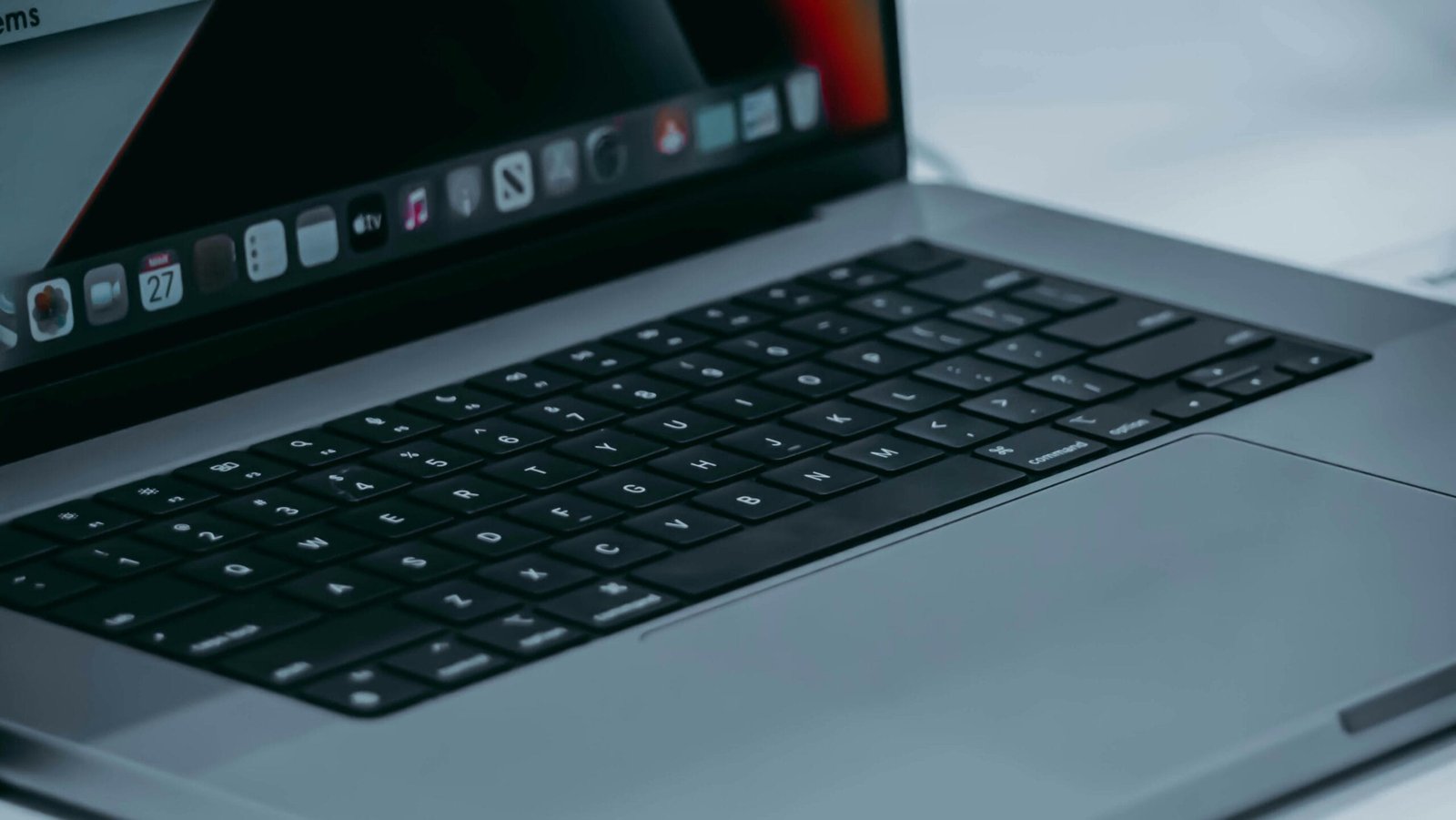 Focused close-up of a sleek laptop keyboard showcasing modern technology.