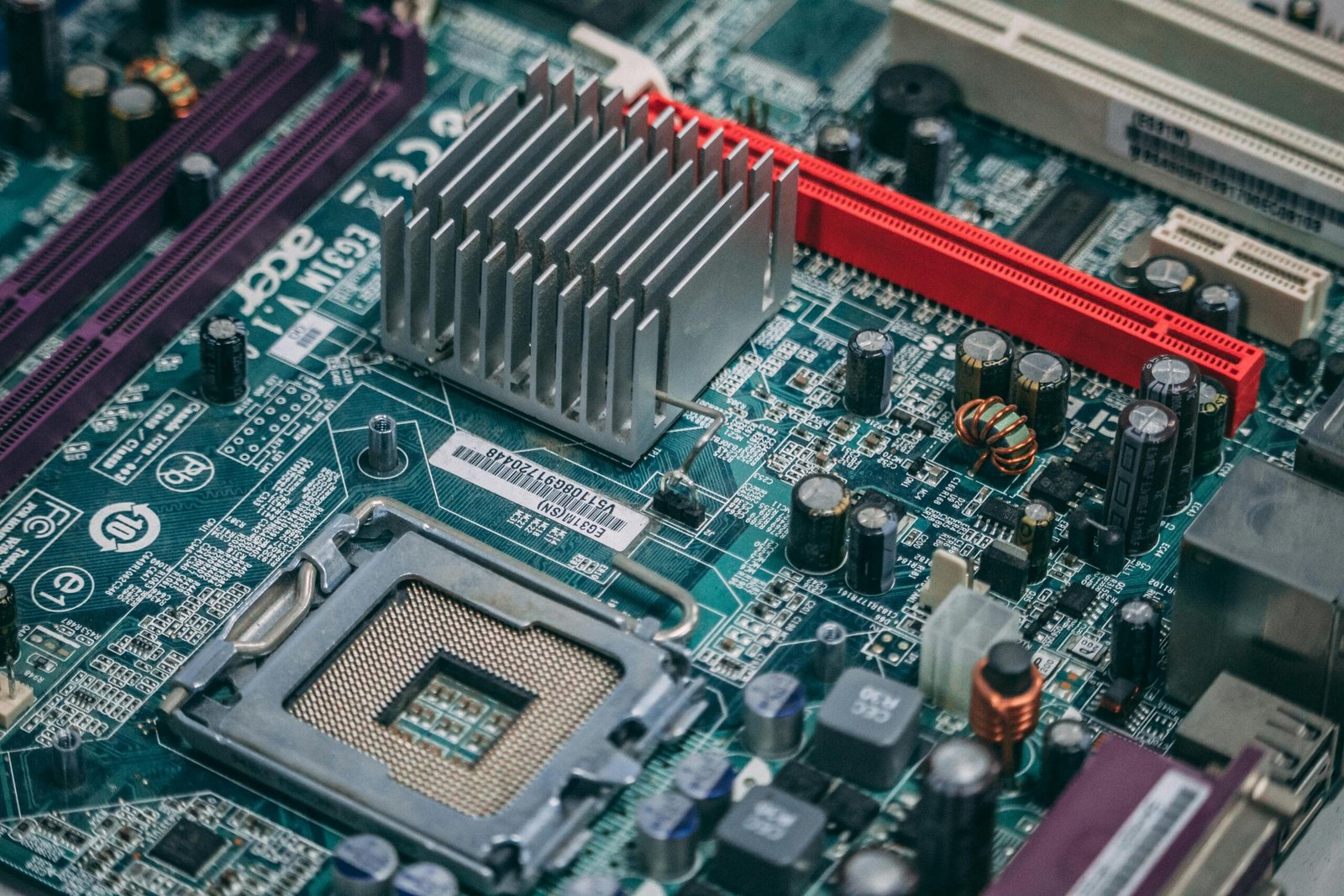 Detailed image of a modern computer motherboard showcasing components and circuits.